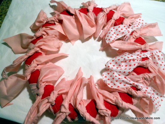 valentine wreath - I continued to add in different valentine fabrics