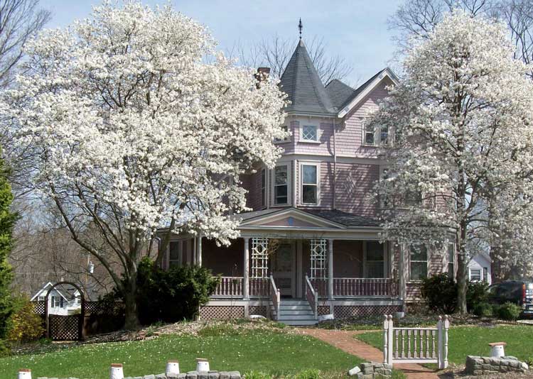 Beautiful Victorian porch with Vintage Woodworks trim