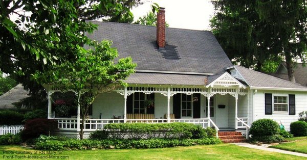 Another perspective of this elegant wraparound porch on this country style home